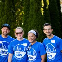 Four Alumni standing together.